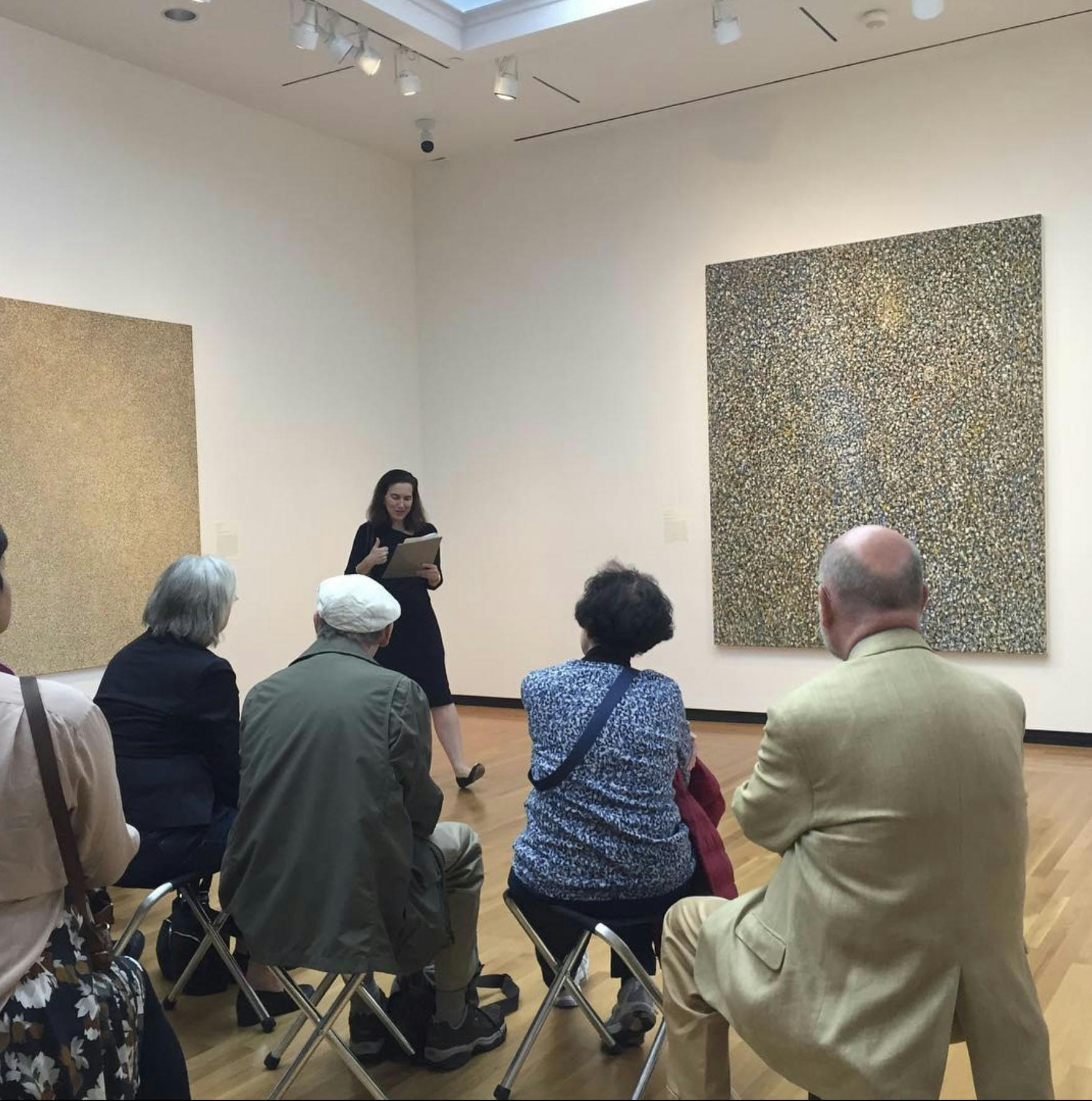 Dr. Anne Collins Goodyear with visitors to the exhibition Richard Pousette-Dart: Painting | Light | Space, Bowdoin College Museum of Art, 2018. – The Richard Pousette-Dart Foundation